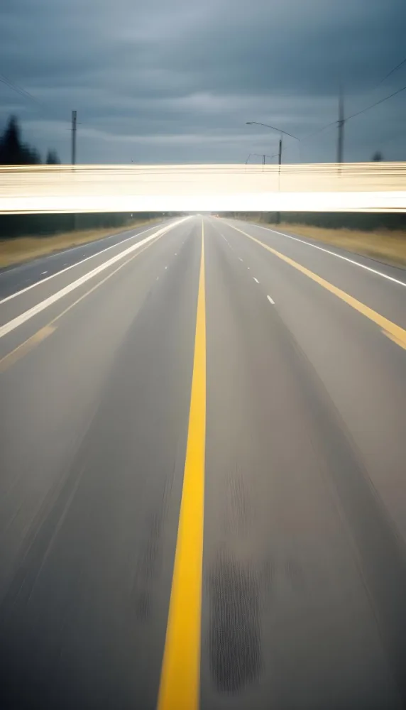 35mm Film Photography A Blurred Image Of A Road With Yellow Center Lines Indicating High Speed Motion High Detail 7 41c6