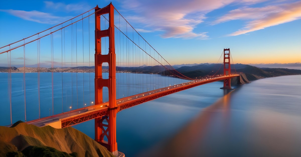 Golden Gate Bridge At Sunset With A Blue Sky And Clouds The Water Is Calm And Reflects The Colors Of The Sky 7 1121