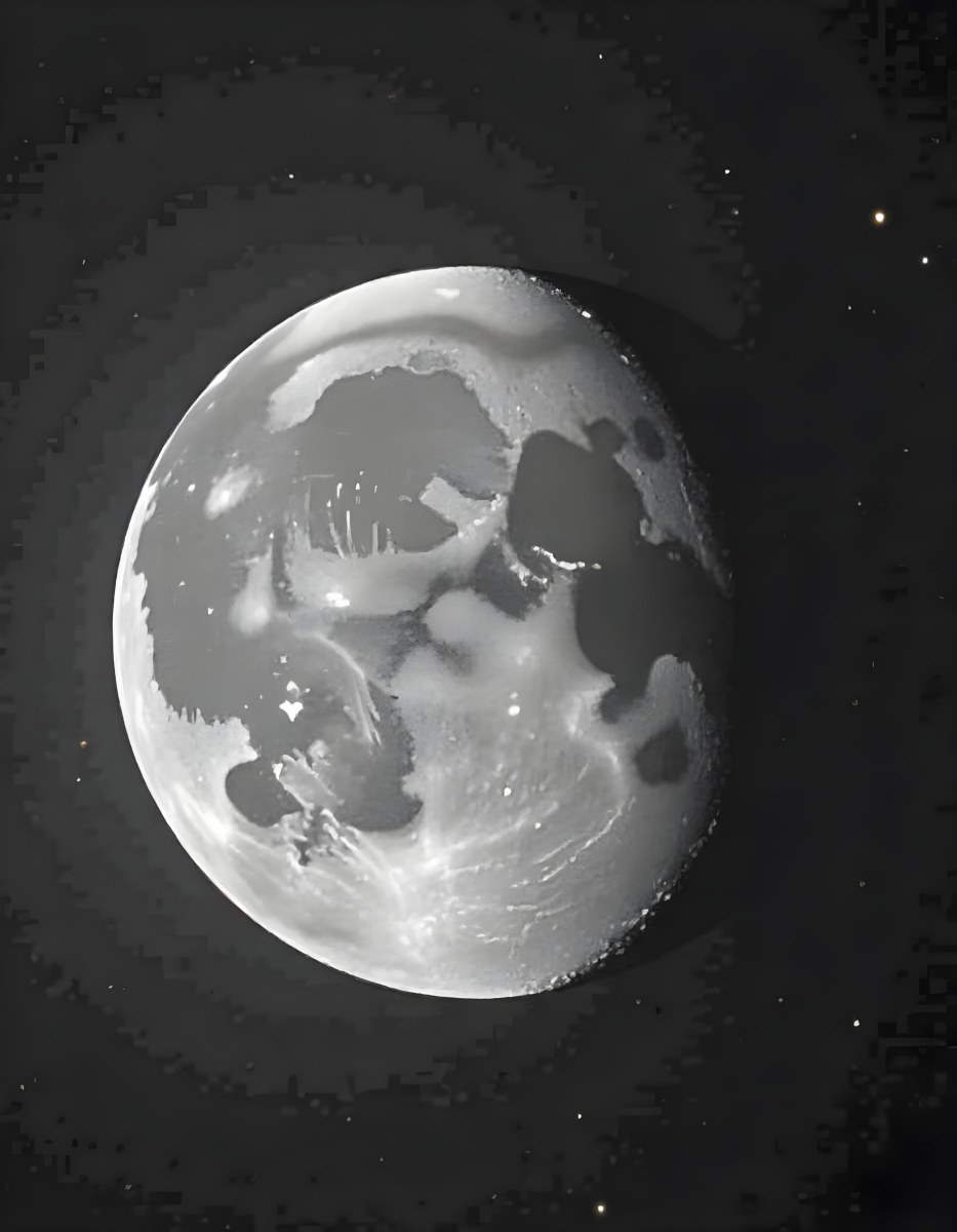 The Moon With Visible Craters And A Gradient Of Light Set Against A Dark Background With Faint Stars 14 6452