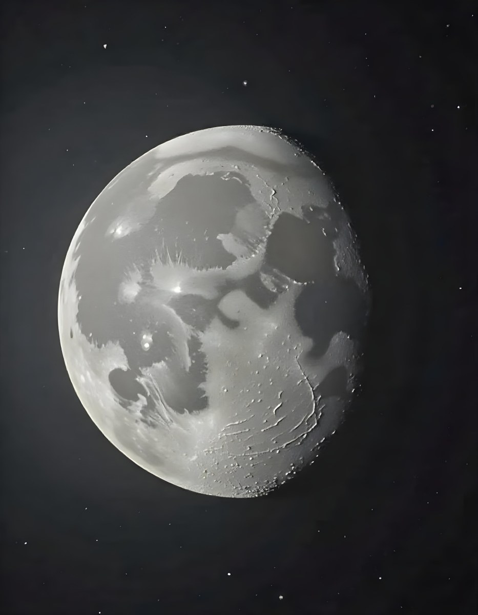 The Moon With Visible Craters And A Gradient Of Light Set Against A Dark Background With Faint Stars 27 888c