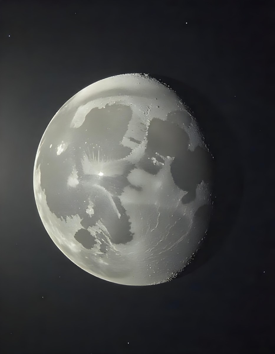 The Moon With Visible Craters And A Gradient Of Light Set Against A Dark Background With Faint Stars 31 67a7