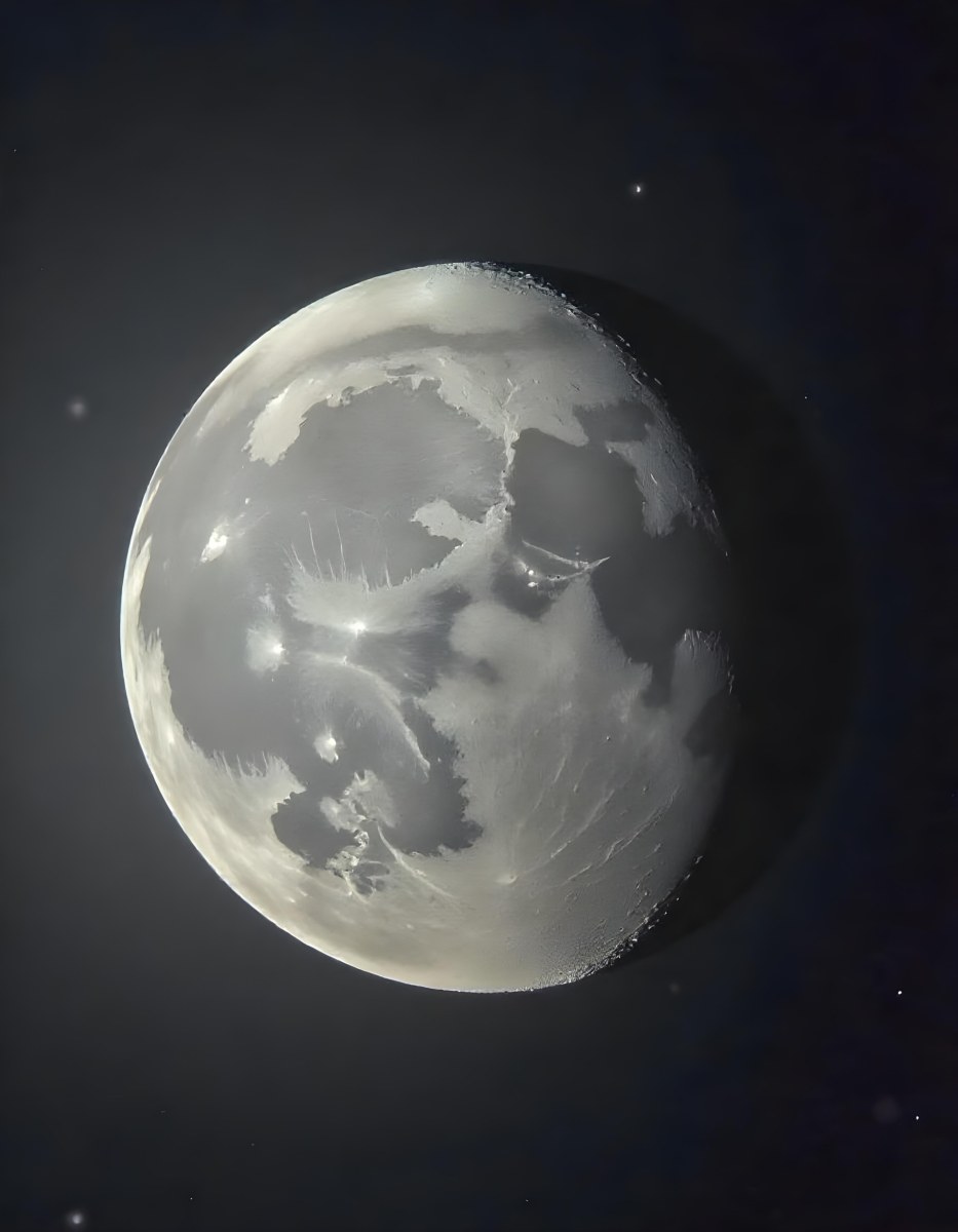 The Moon With Visible Craters And A Gradient Of Light Set Against A Dark Background With Faint Stars 32 2e64