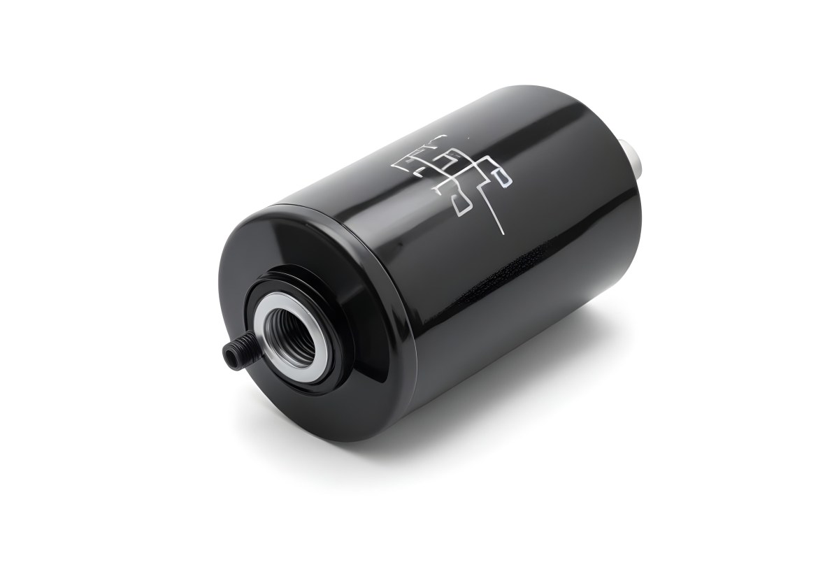 A Black Oil Filter With A Black Threaded Insert Lying On A Black Surface With A Slight Shadow Showcasing Its Cylindrical Shape And Construction 22 Cd8e