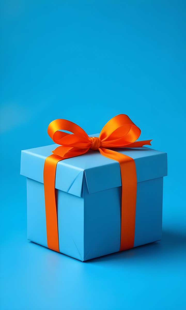 A Blue Gift Box With An Orange Ribbon On A Blue Background The Ribbon Is Tied In A Bow On Top Of The Box 39 482c