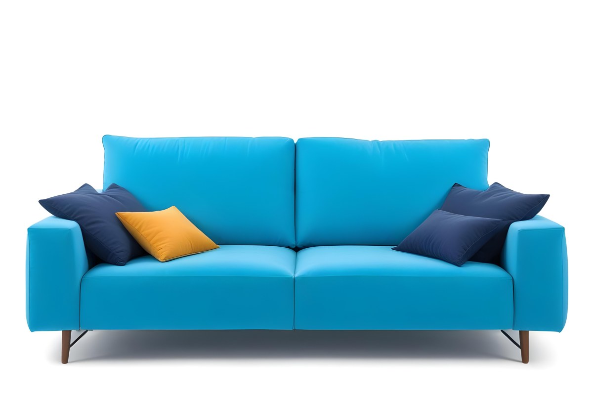 A Blue Sofa With Two Pillows One White And One White In A White Background 6 52ec
