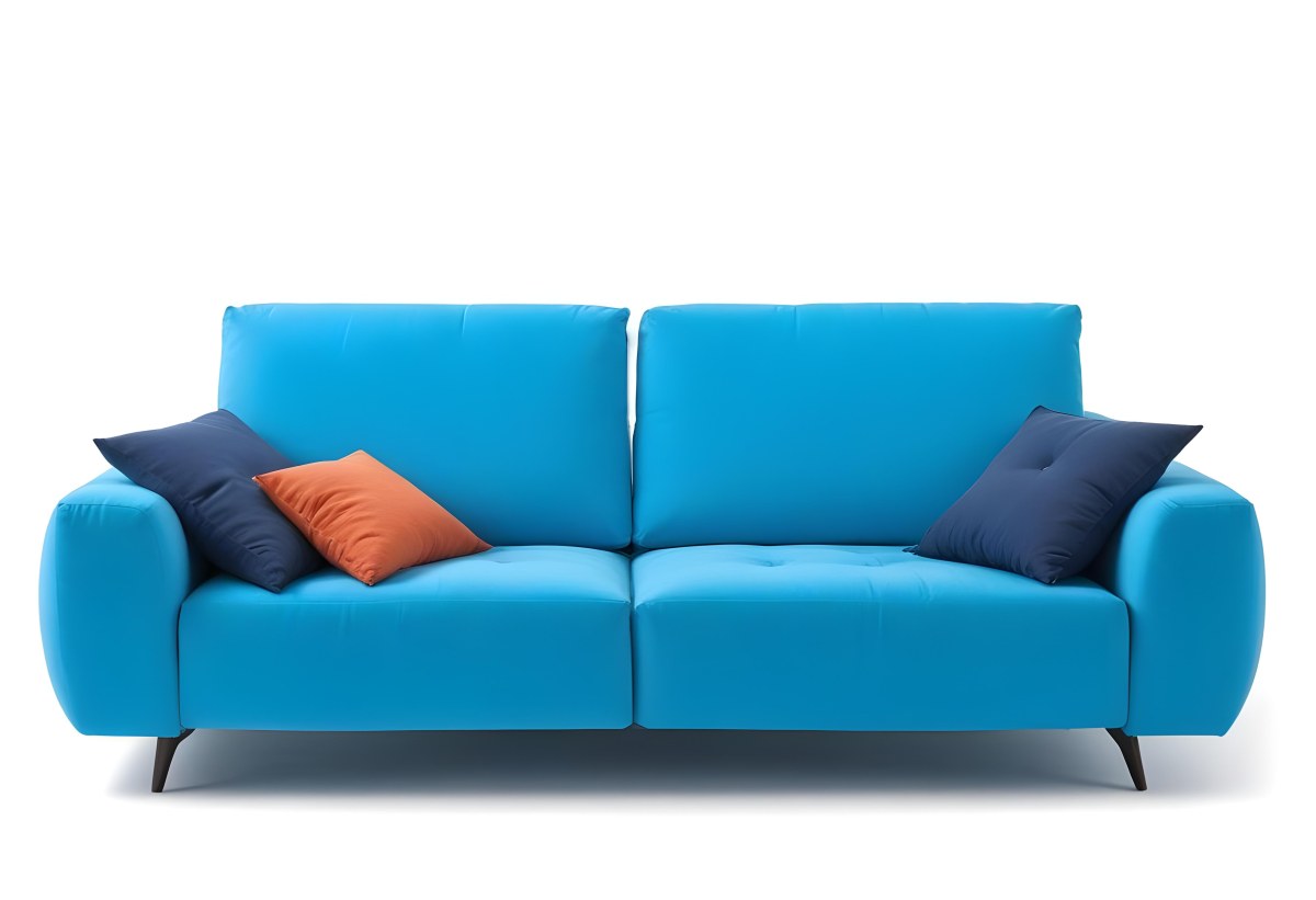 A Blue Sofa With Two Pillows One White And One White In A White Background 8 Ccd4