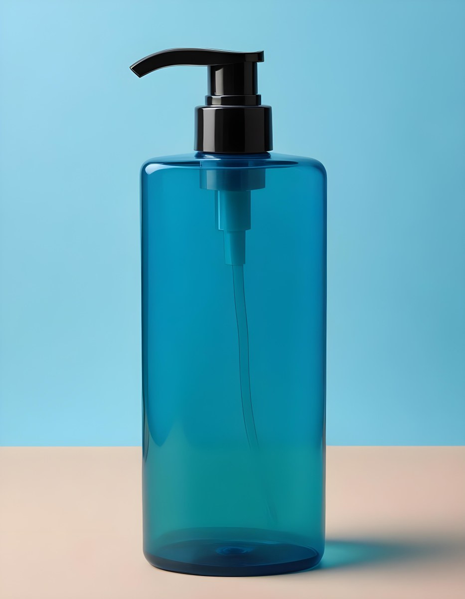 A Blue Transparent Plastic Bottle With A Transparent Dispenser Pump Containing Liquid Soap On A Beige Surface With A Light Blue Background 27 6486