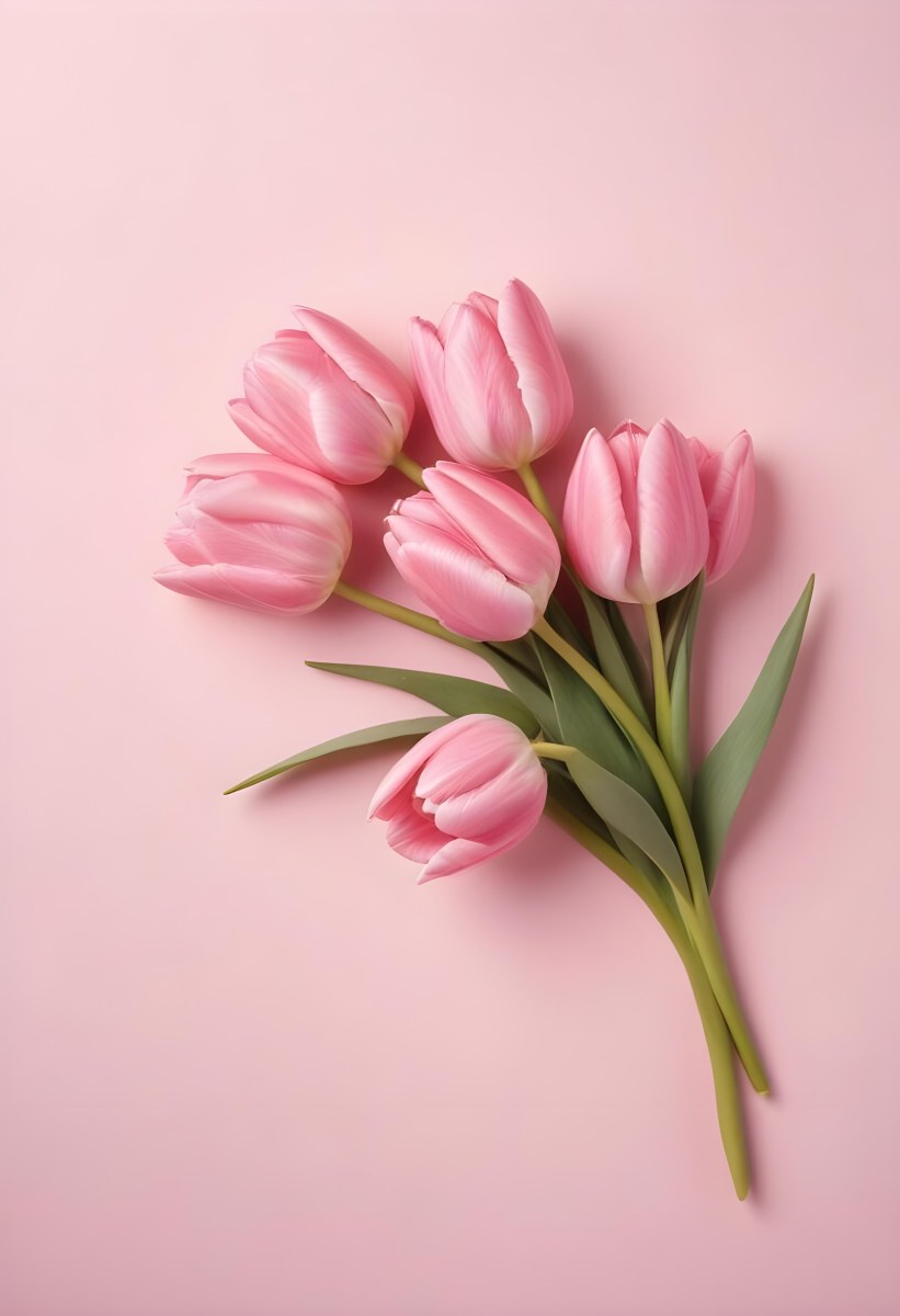 A Bouquet Of Pink Tulips In A Glass Vase Against A Pink Background 92 9d01