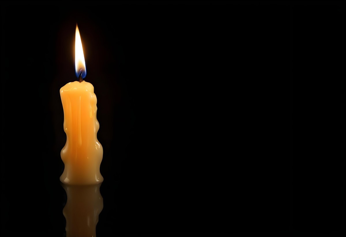 A Burning Candle With A Bright Flame The Wax Is Dripping Down The Side Casting A Warm Glow In A Dark Room 6 00eb