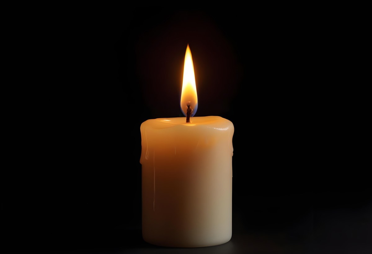 A Candle With A Bright Flame Casting A Warm Glow In The Darkness Creating A Sense Of Hope And Remembrance On A Black Background 24 1193