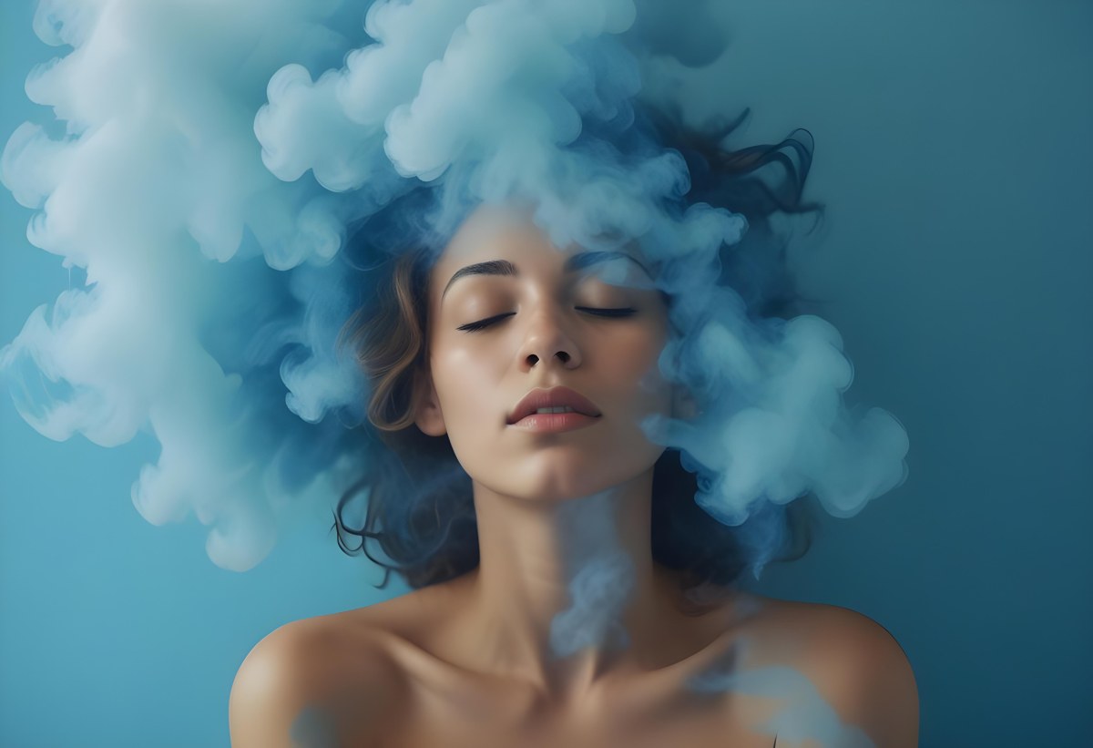 A Caucasian Woman 25 Years Old Light Skin Closed Eyes With Blue Smoke Around Her Head Blue Background 58 E1cb