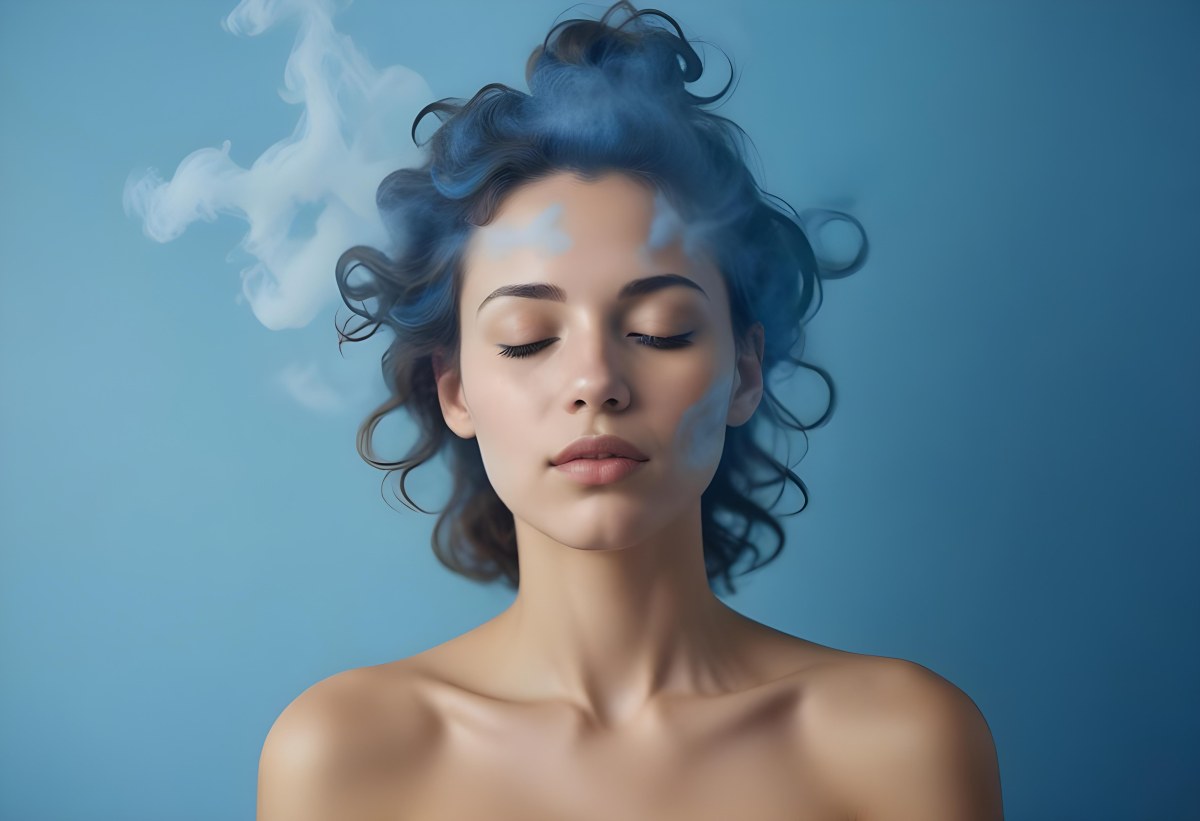 A Caucasian Woman 25 Years Old Light Skin Closed Eyes With Blue Smoke Around Her Head Blue Background 7 A5b8