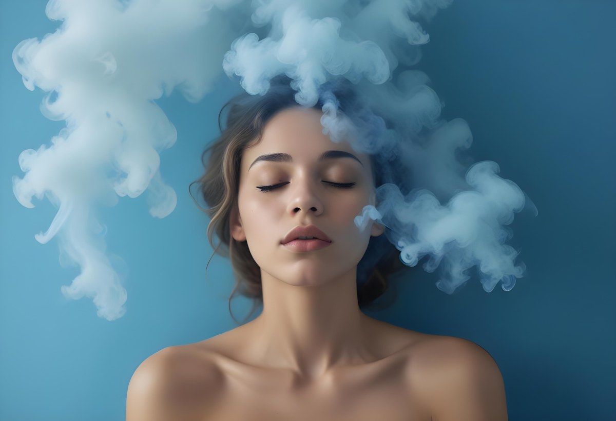 A Caucasian Woman 25 Years Old Light Skin Closed Eyes With Blue Smoke Around Her Head Blue Background 72 2c53