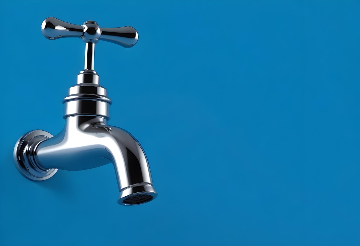 A Chrome Faucet With A Cross Handle Clean And Shiny On A Blue Background Water Conservation Concept Plumbing Fixture Modern Design Minimalist 14 2a38