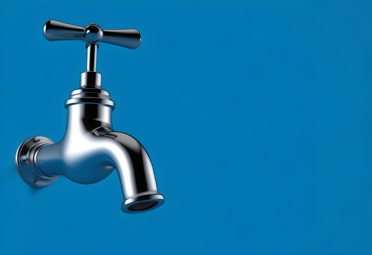 A Chrome Faucet With A Cross Handle Clean And Shiny On A Blue Background Water Conservation Concept Plumbing Fixture Modern Design Minimalist 20 13de