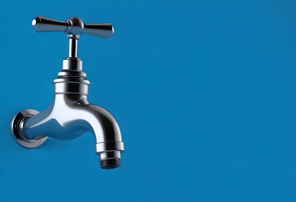 A Chrome Faucet With A Cross Handle Clean And Shiny On A Blue Background Water Conservation Concept Plumbing Fixture Modern Design Minimalist 9 A47b