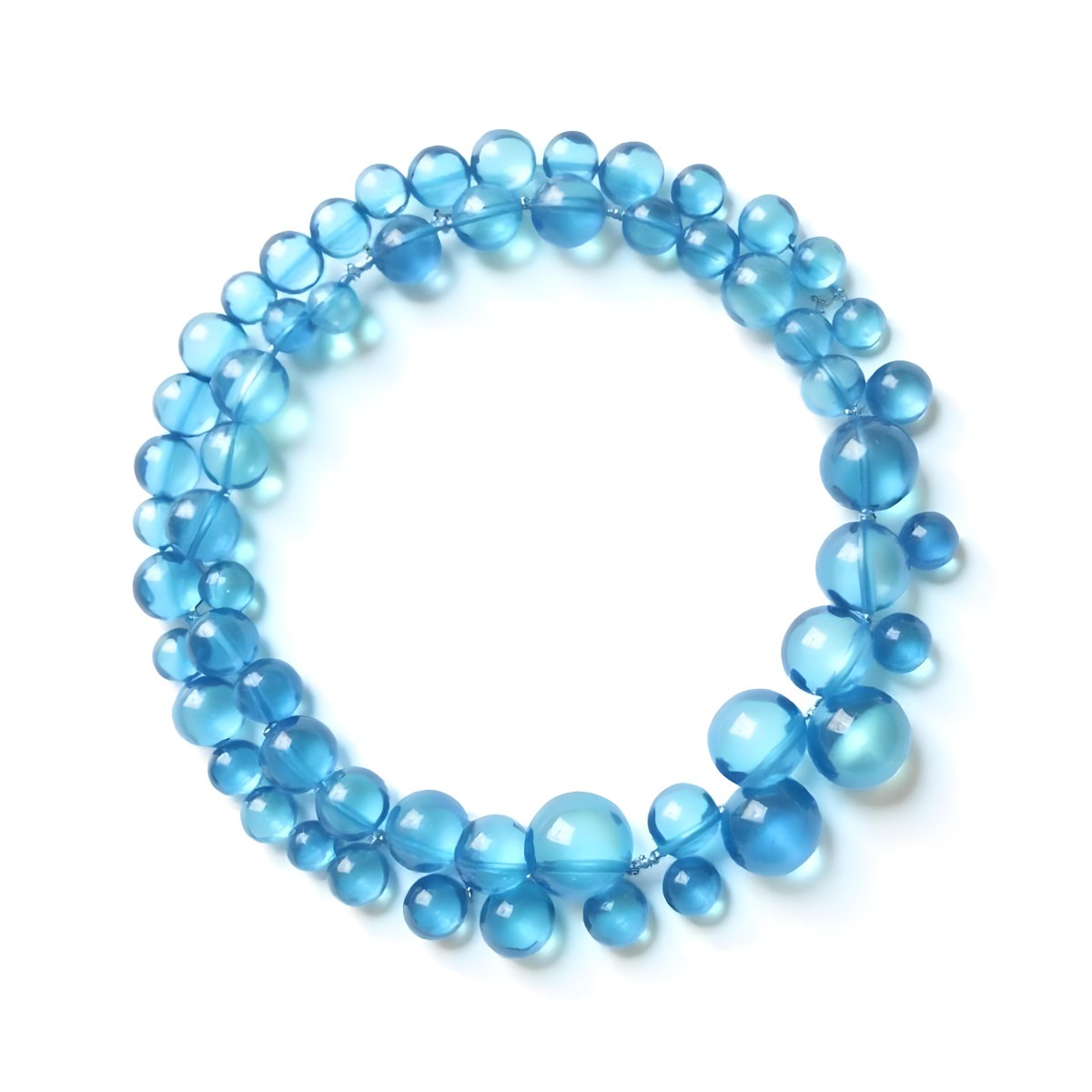 A Circular Arrangement Of Blue Gemstones Or Beads Against A White Background 6 5ab6
