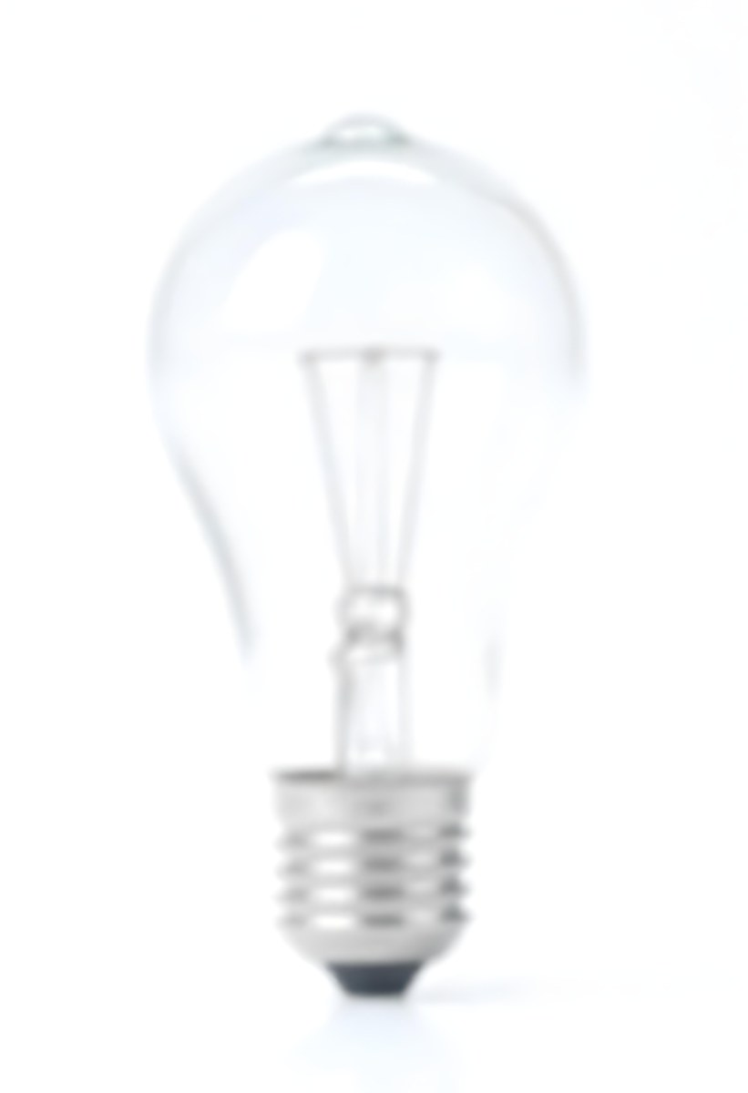 A Clear Light Bulb With Visible Filament And Internal Components Set Against A Plain White Background Showcasing A Clean And Minimalist Design 42 1ec6