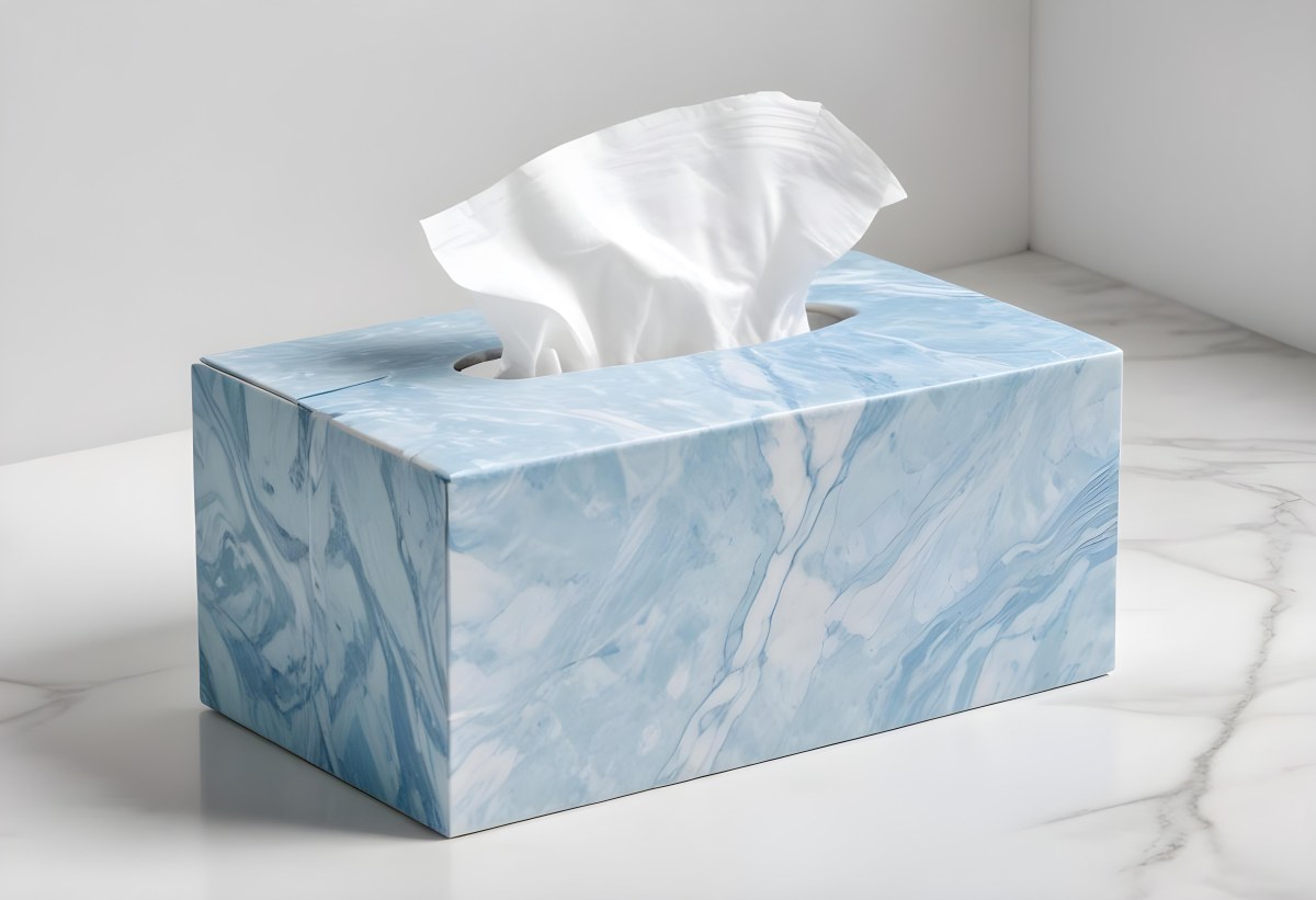 A Light Blue Tissue Box With A Marble Pattern Filled With White Tissues Sitting On A White Surface With A White Background 6 3b21