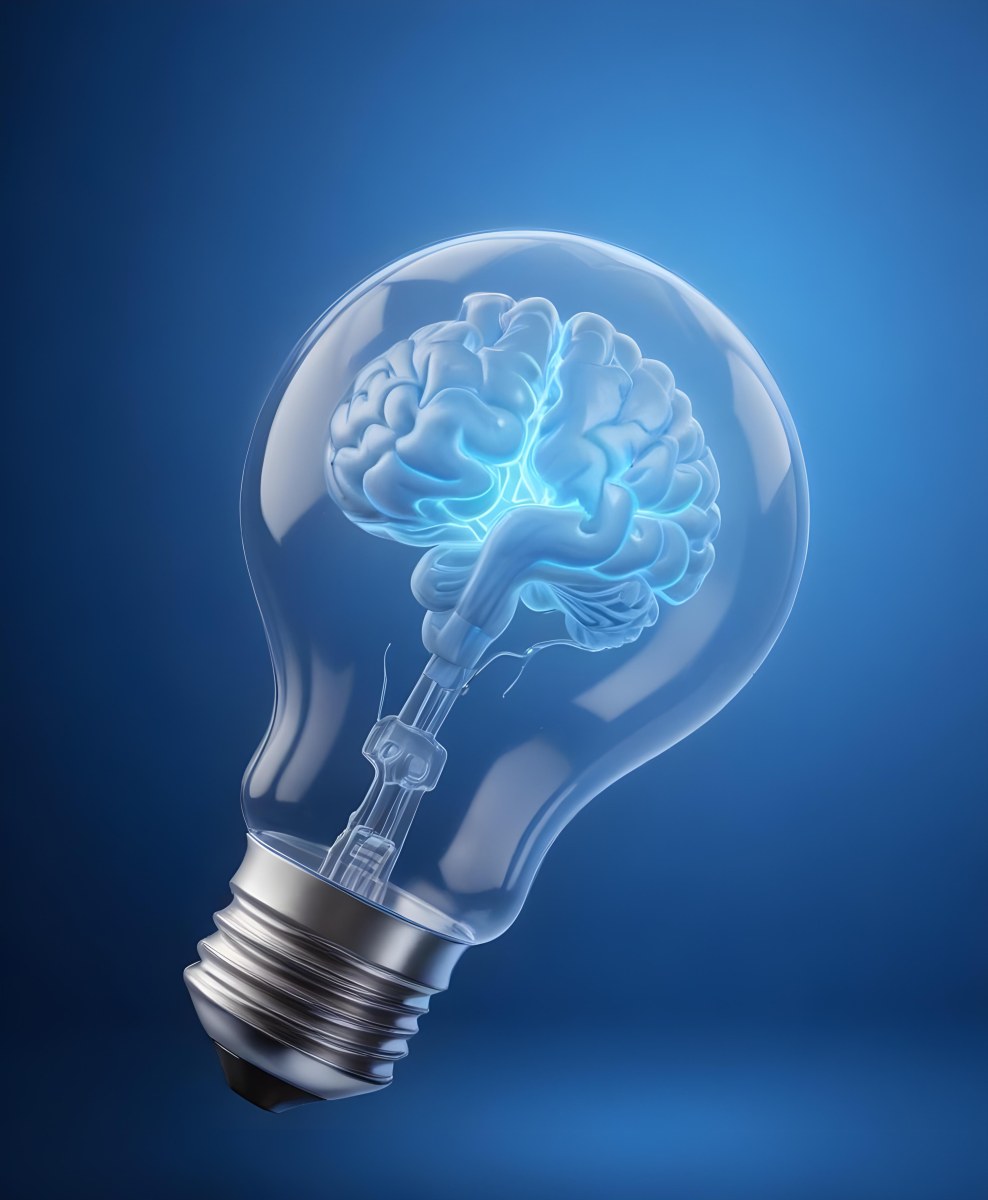 A Light Bulb With A Brain Inside The Brain Is Blue And Glowing The Background Is Blue And Gradient 5 A1a3