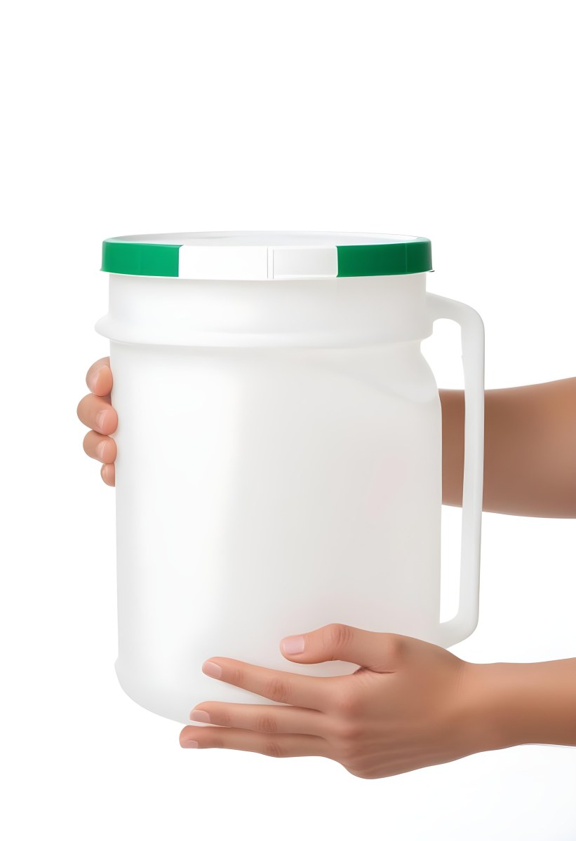 A Person S Hands Holding A Large White Plastic Container Or Jug With A Green Cap 2 5b74