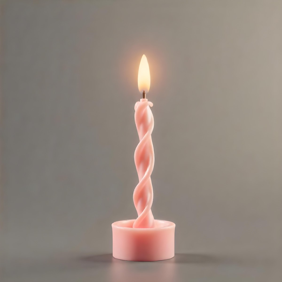 A Pink Spiral Candle With A Bright Flame On Top Casting A Bright Glow Simple Gray Background 20 A6f5