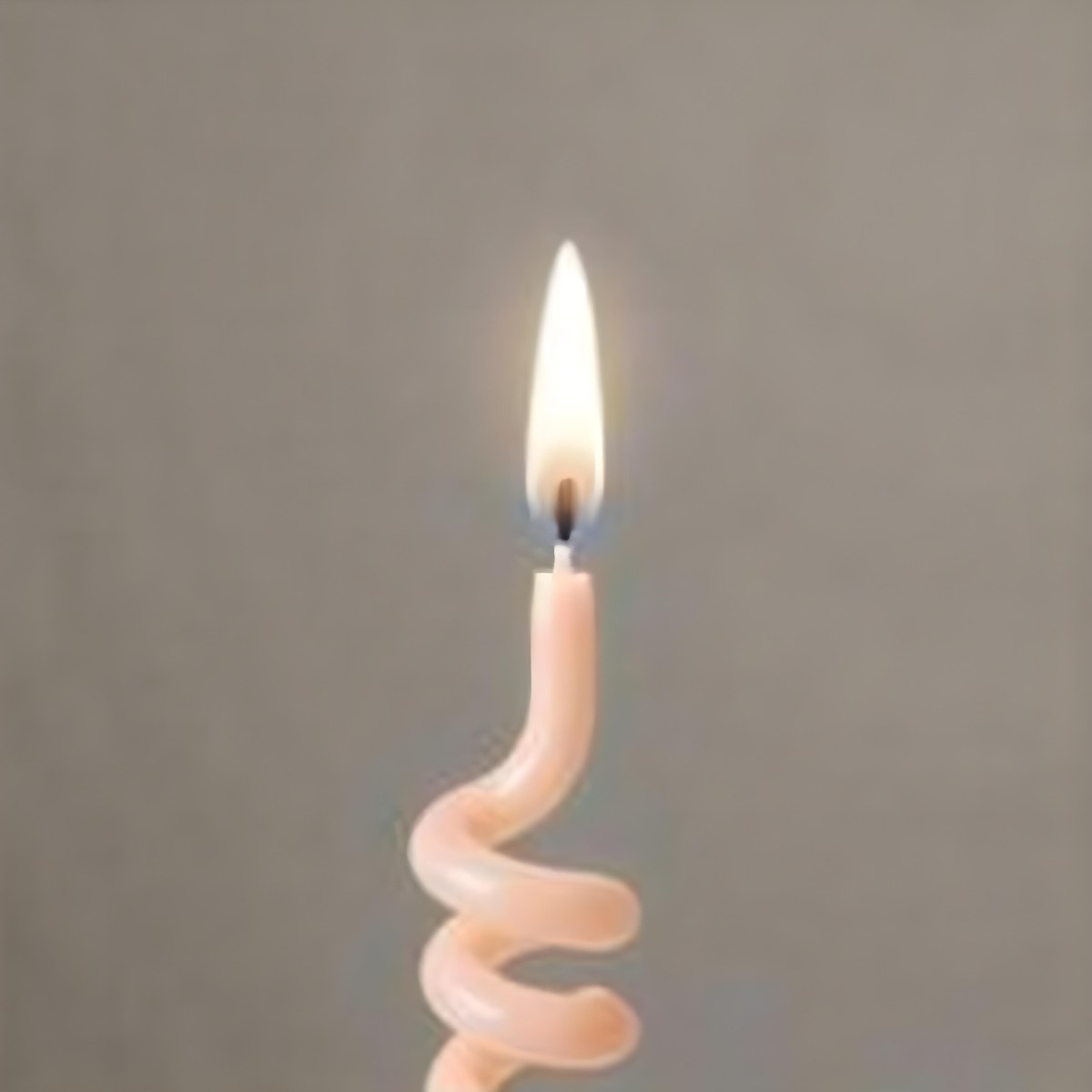 A Pink Spiral Candle With A Bright Flame On Top Casting A Bright Glow Simple Gray Background 23 4247