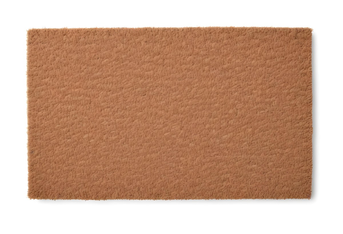 A Rectangular Coir Doormat With A Rough Fibrous Texture Showcasing A Natural Brown Color Placed On A White Surface 5 580f