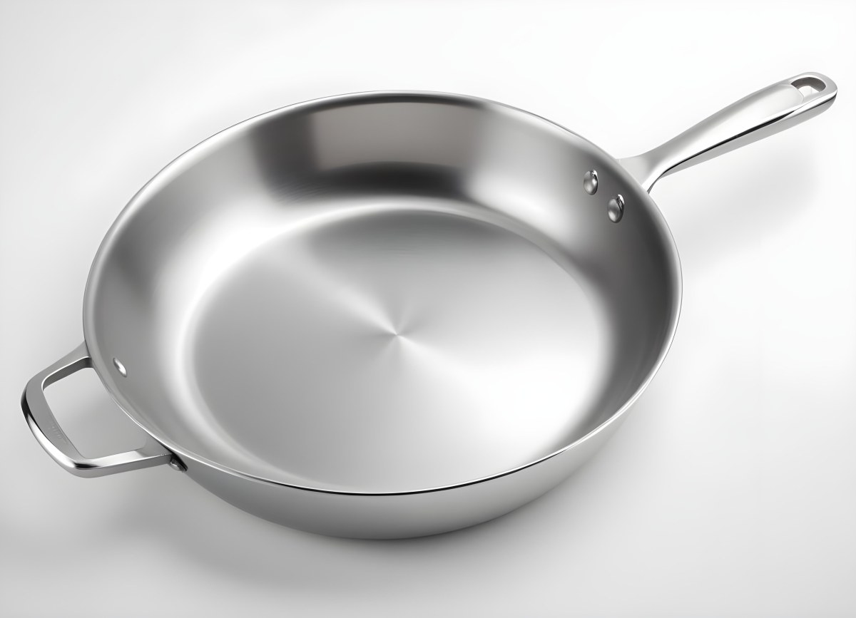 A Stainless Steel Frying Pan With A Long Handle Shiny Surface And A Hole At The End Of The Handle Isolated On White Background 9 F87d
