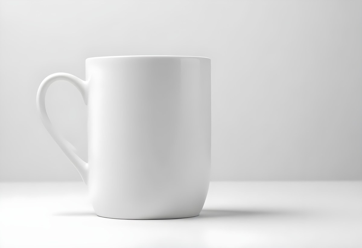 A White Ceramic Mug With A Handle On A White Surface Minimalist Style Clean And Simple Design Soft Lighting Plain White Background 5 731a