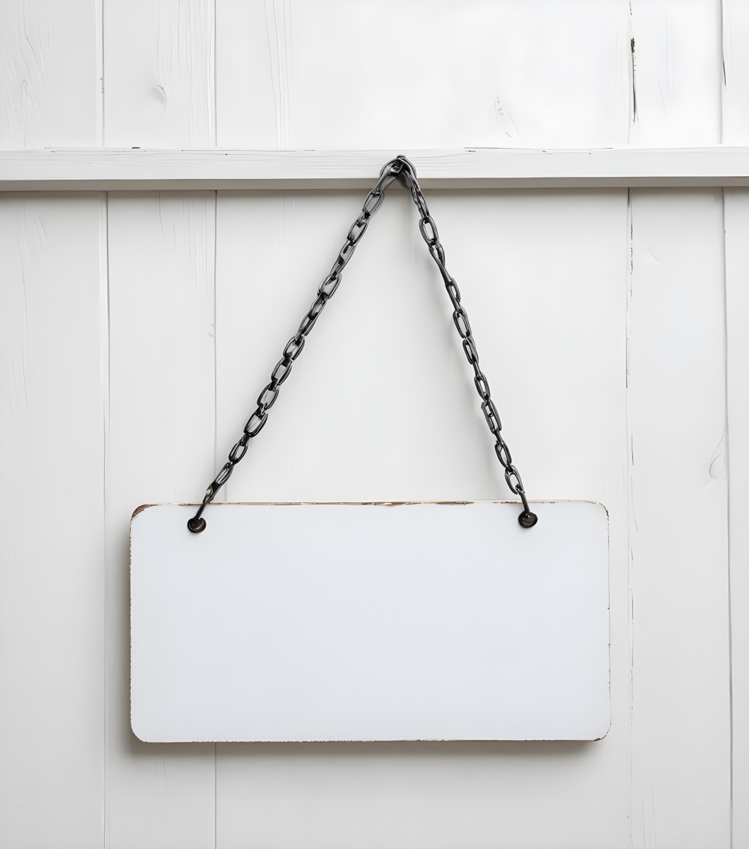 A White Wooden Sign Hanging From Two Metal Chains The Background Is Plain White 13 F57c