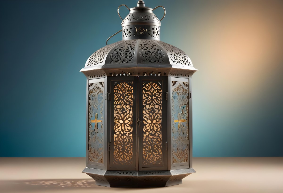 An Ornate Metal Lantern With Intricate Floral Cutouts Casting A Warm Glow On A Sandy Surface Against A Soft Gradient Blue Background 9 236c
