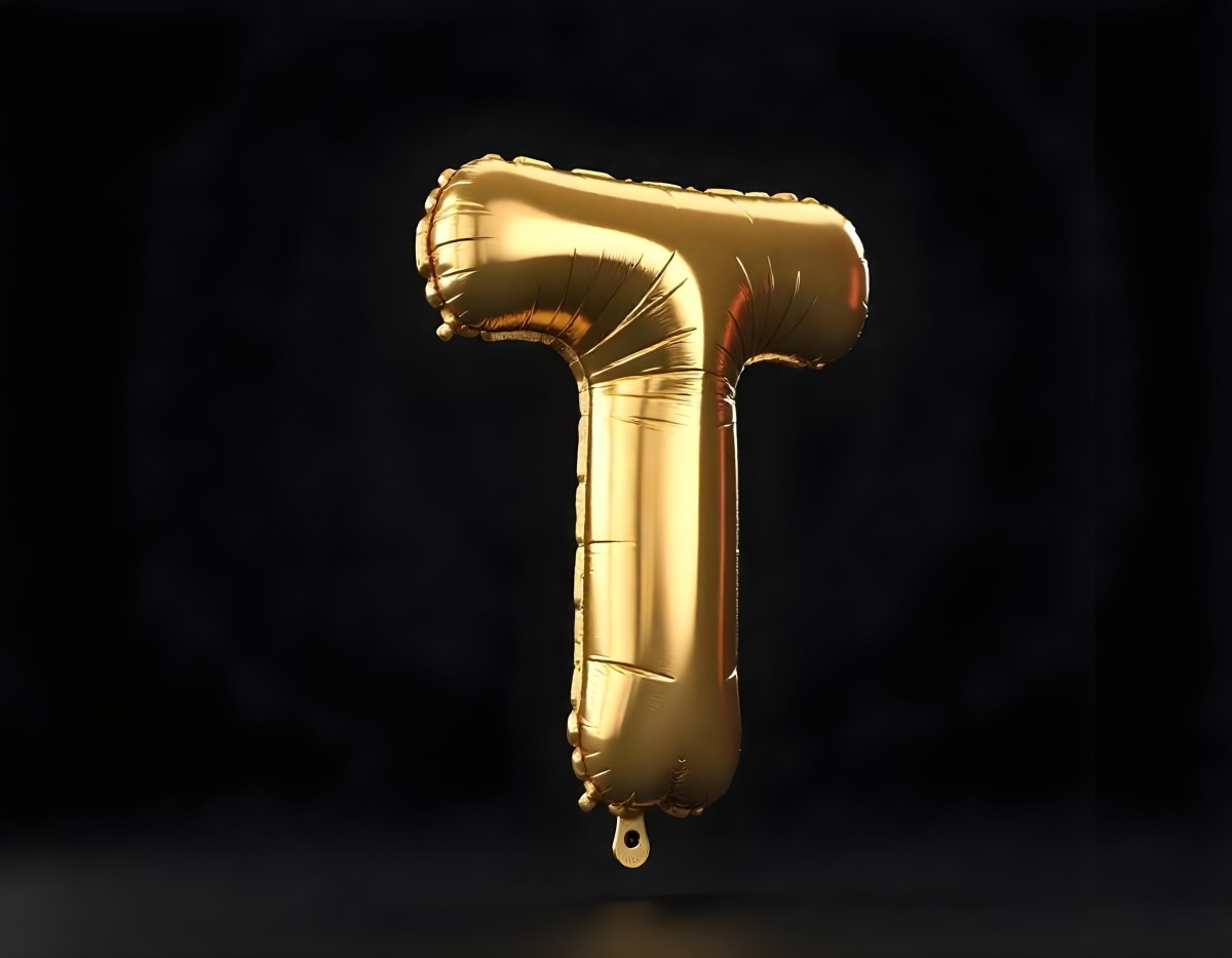 Golden Balloon Letter T Shiny And Reflective Floating In A Dark Background Casting A Soft Shadow Creating A Luxurious And Celebratory Atmosphere 14 37f1