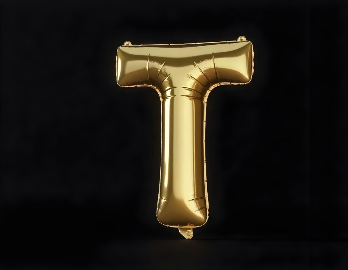 Golden Balloon Letter T Shiny And Reflective Floating In A Dark Background Casting A Soft Shadow Creating A Luxurious And Celebratory Atmosphere 19 7e9e