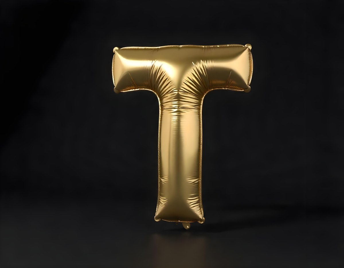 Golden Balloon Letter T Shiny And Reflective Floating In A Dark Background Casting A Soft Shadow Creating A Luxurious And Celebratory Atmosphere 8 5f8b