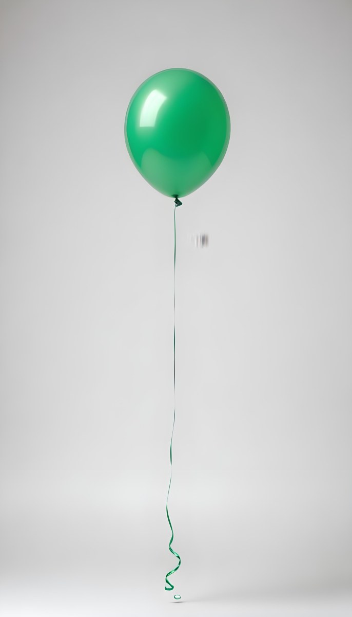 Green Balloon With A String Attached Floating In The Air Isolated On A White Background 24 F77c