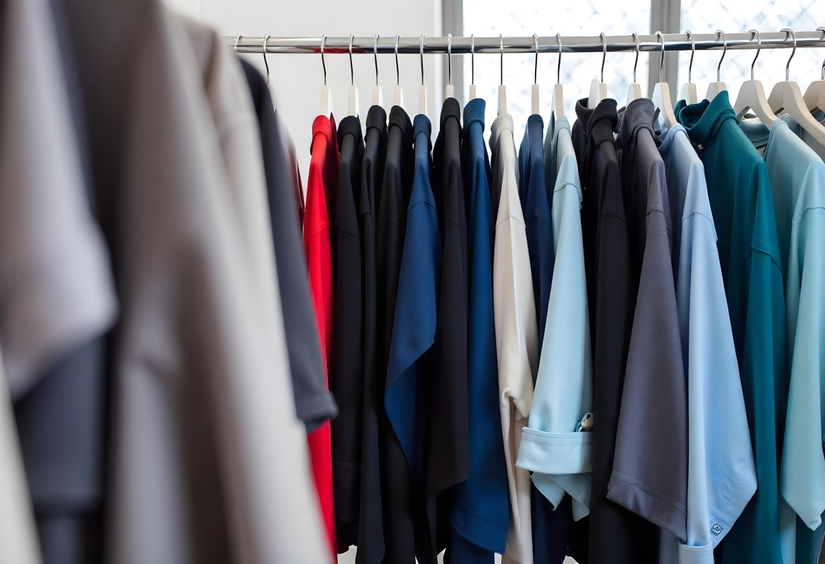 Rows Of Colorful Shirts And Jackets Hanging On A Clothing Rack In A Store Or Boutique 6 7913