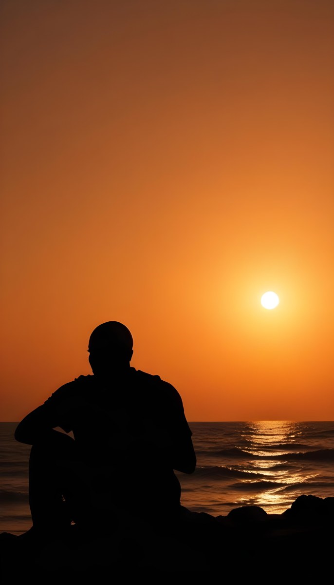 Silhouette Of A Black Man 30 Years Old Bald Contemplating The Sunset On The Beach Orange Sky Dark Ocean 16 52f5