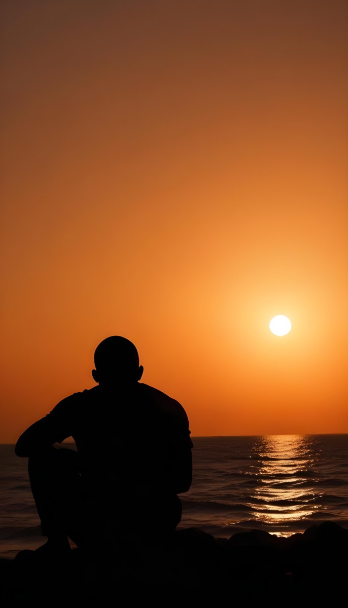 Silhouette Of A Black Man 30 Years Old Bald Contemplating The Sunset On The Beach Orange Sky Dark Ocean 23 A8a1
