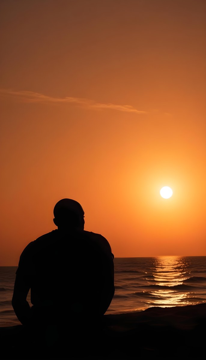 Silhouette Of A Black Man 30 Years Old Bald Contemplating The Sunset On The Beach Orange Sky Dark Ocean 36 Fcbb