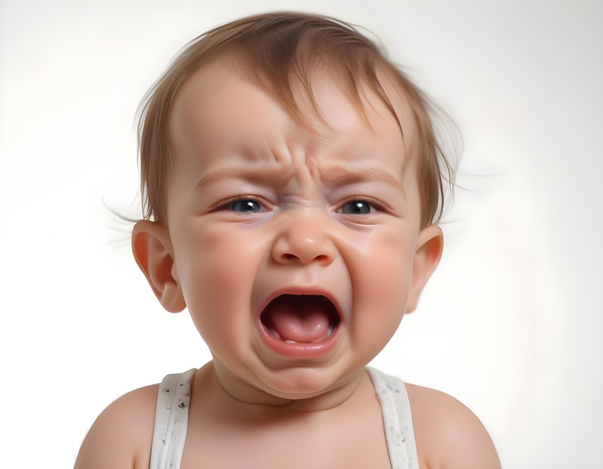 A Caucasian Baby Approximately 1 Year Old With Short Light Brown Hair Crying Intensely The Baby Has A Distressed Expression With Tears Visible On The Cheeks The Background Is Plain And Light Colored 17 Ae99