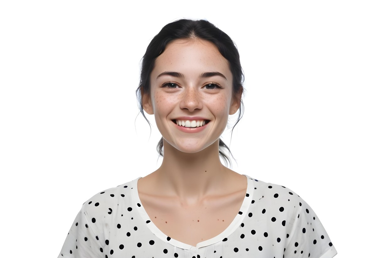 A Caucasian Woman 28 Years Old With Freckles And Black Hair Smiling And Wearing A White Shirt With Black Dots In A Black Background 8 424a