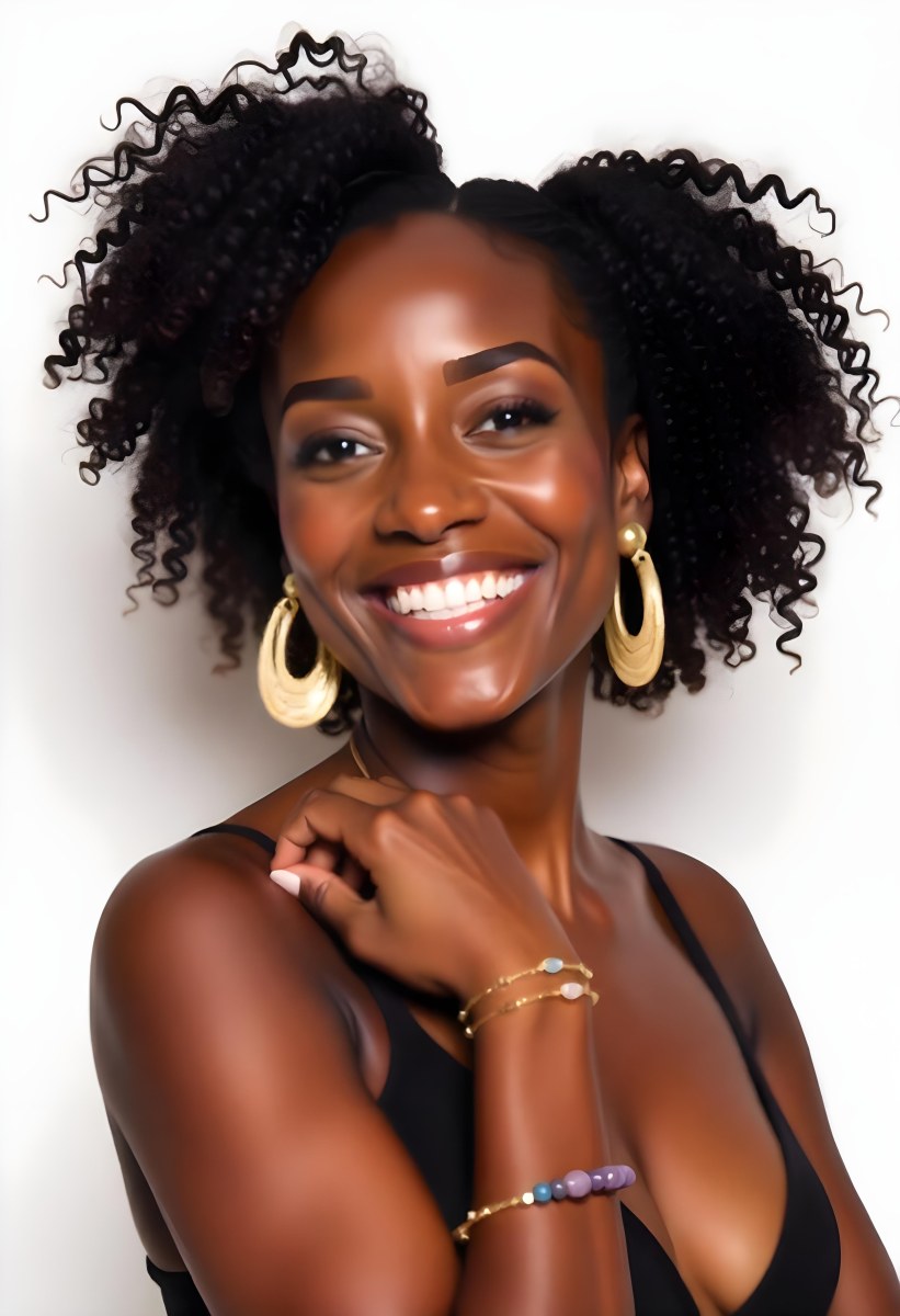 A Young Black Woman With Curly Dark Hair And A Warm Friendly Smile 7 26a6