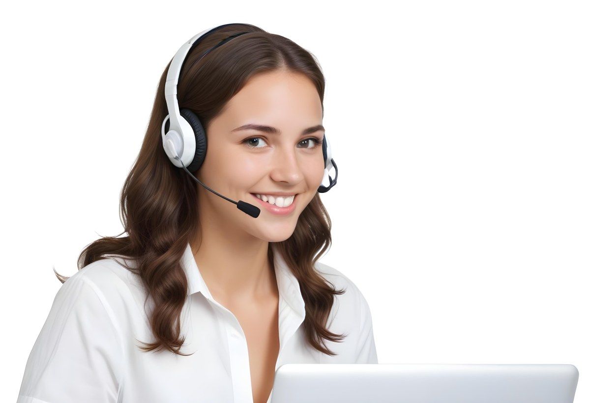 A Young Caucasian Woman Approximately 25 Years Old With Long Wavy Brown Hair Wearing A White Shirt And A Headset With A Microphone She Is Smiling And Looking Directly At The Camera With A Laptop Visible In The Foreg 37 B38c