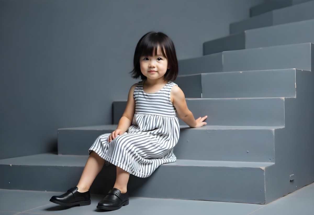 An Asian Girl 6 Years Old Black Hair Sitting On Gray Stairs Wearing A Striped Dress And Black Shoes Gray Background 27 A4c8
