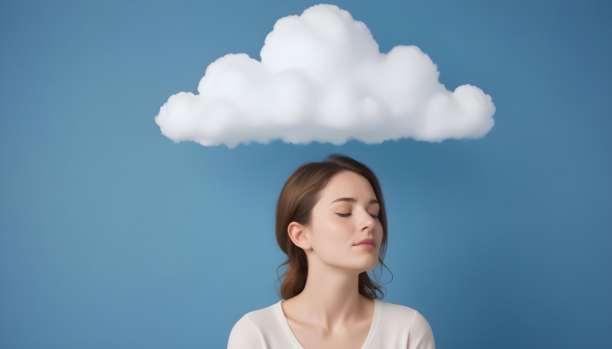 White Woman 25 Years Old With Closed Eyes And A Cloud Above Her Head Blue Background 5 223e