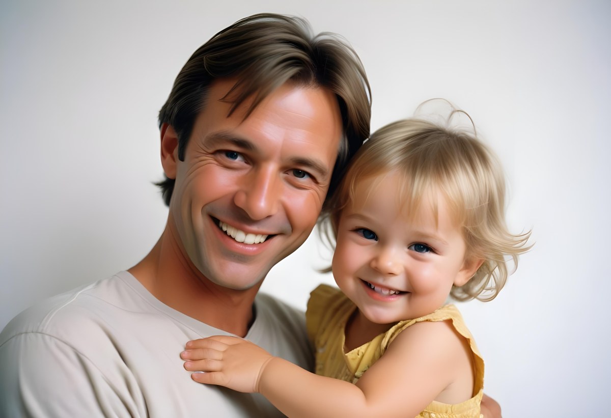 Young Caucasian Man With Short Blonde Hair And A Friendly Smile Holding A Young Blonde Toddler Girl Who Is Also Smiling In A Sunny Park 23 Ebb6