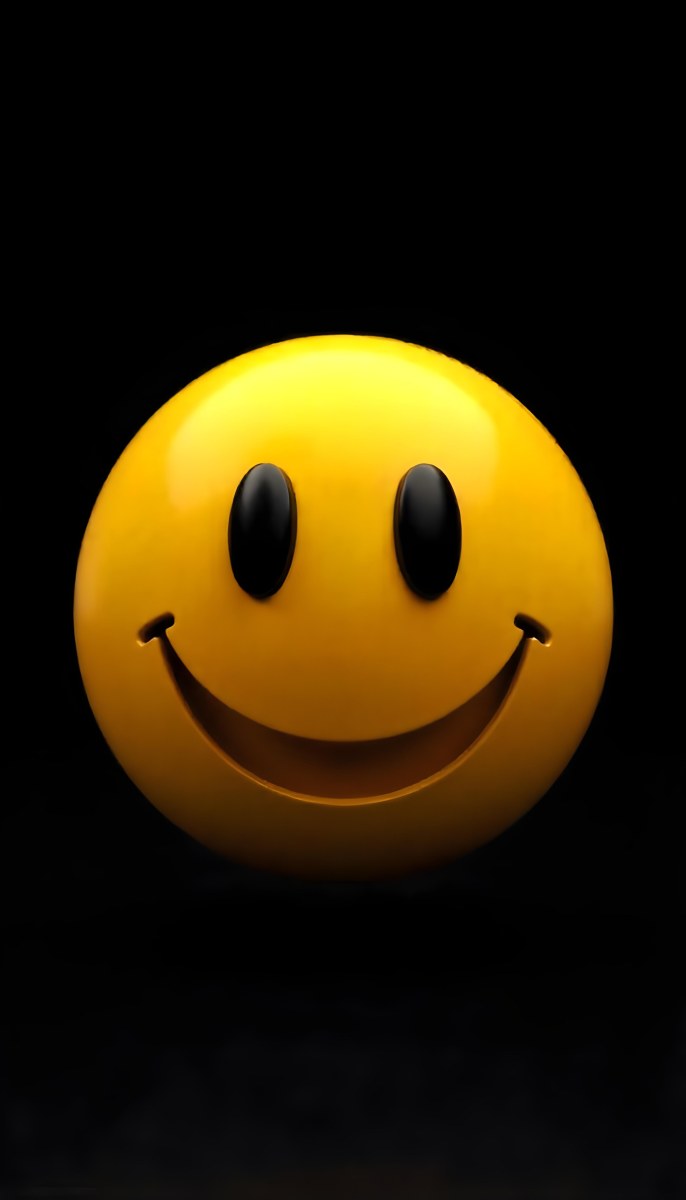 Yellow Smiley Face With Black Eyes And Mouth On A Black Background 26 3b24
