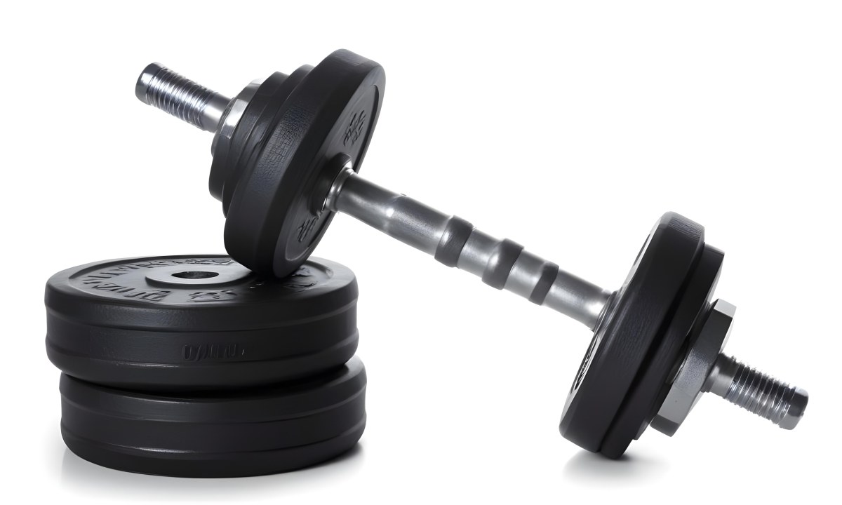 A Pair Of Black Metal Dumbbells With Weight Plates Stacked On A Dark Surface 1 72b9