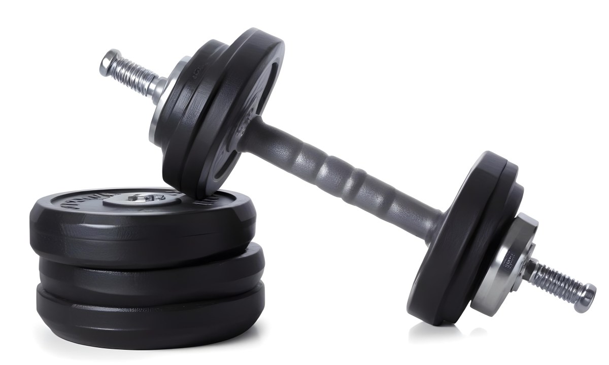 A Pair Of Black Metal Dumbbells With Weight Plates Stacked On A Dark Surface 5 5262